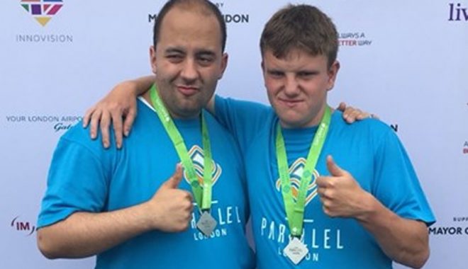 Ben and Aran with their medals